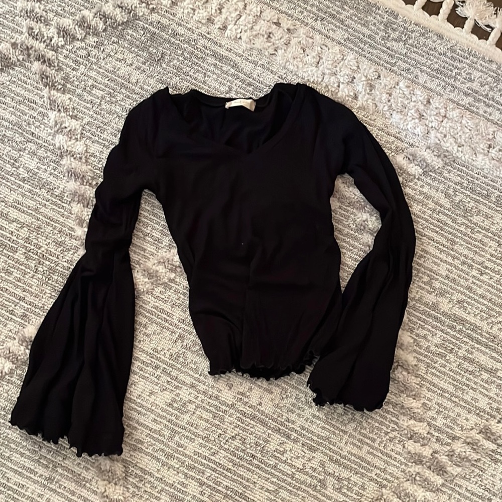 black bell sleeved top